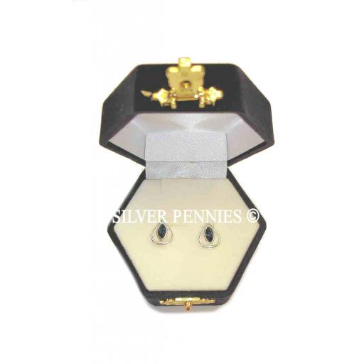 925 Sterling Silver And Blue Topaz Studs